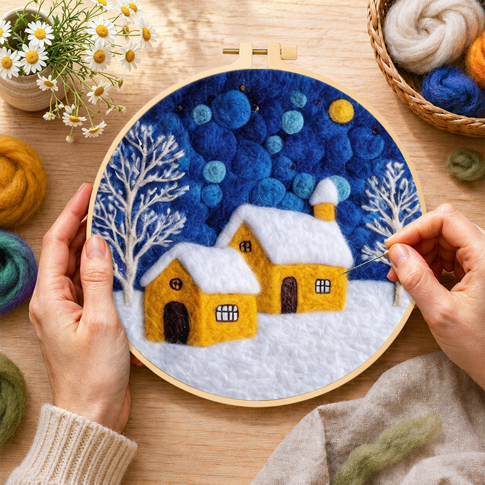 Creating the twin yellow cottages under the starry sky wool painting by hand with a felting needle