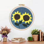 Finished two bright sunflowers artwork displayed on a wall