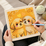 Creating handmade two cuddly puppies punch needle artwork