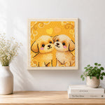 Finished two cuddly puppies artwork displayed on a wall