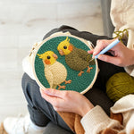 Creating handmade two cute parrots punch needle artwork