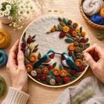Creating the two hummingbirds with romantic floral wreath wool painting by hand with a felting needle