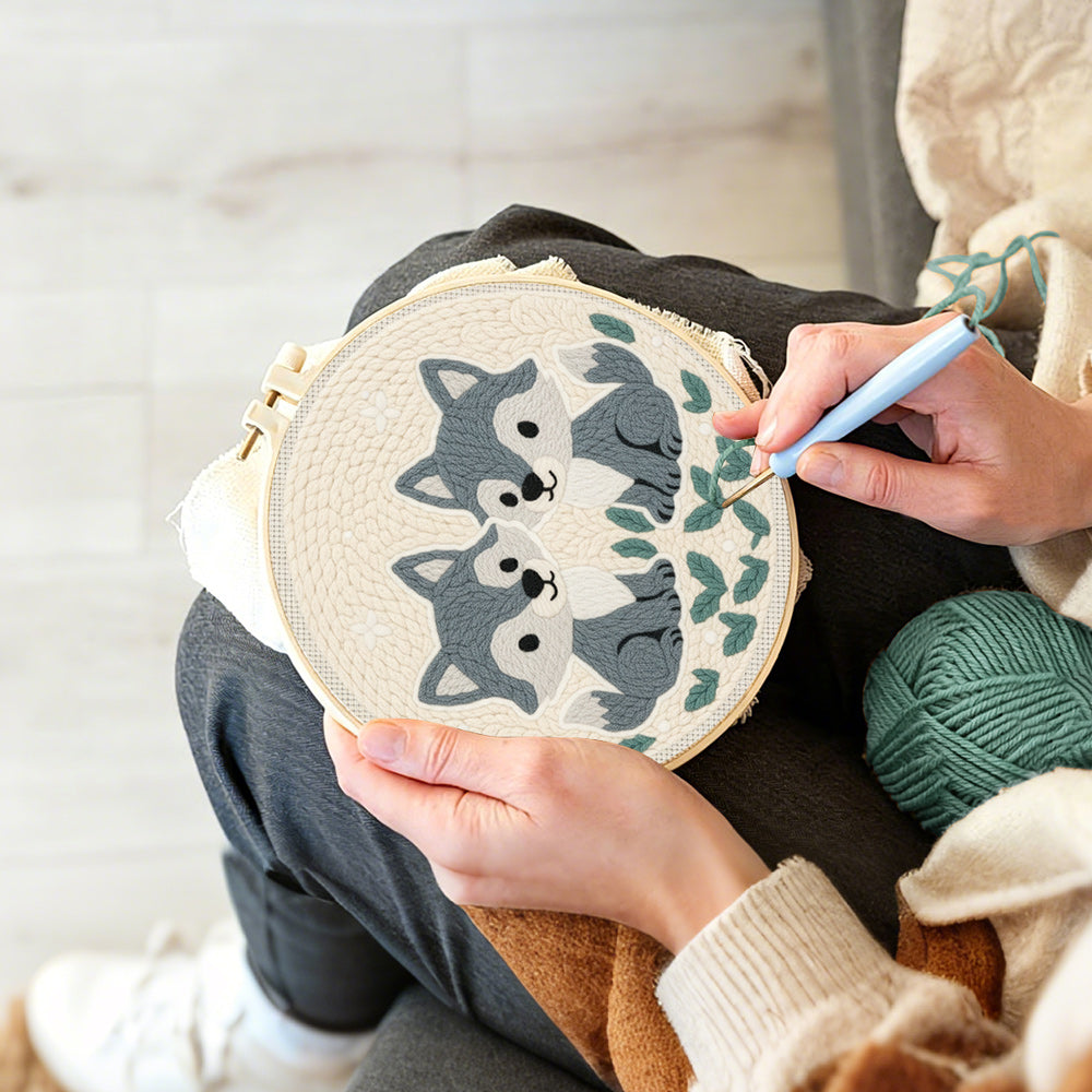 Creating handmade two little grey foxes punch needle artwork