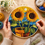 Creating the two potted sunflowers wool painting by hand with a felting needle
