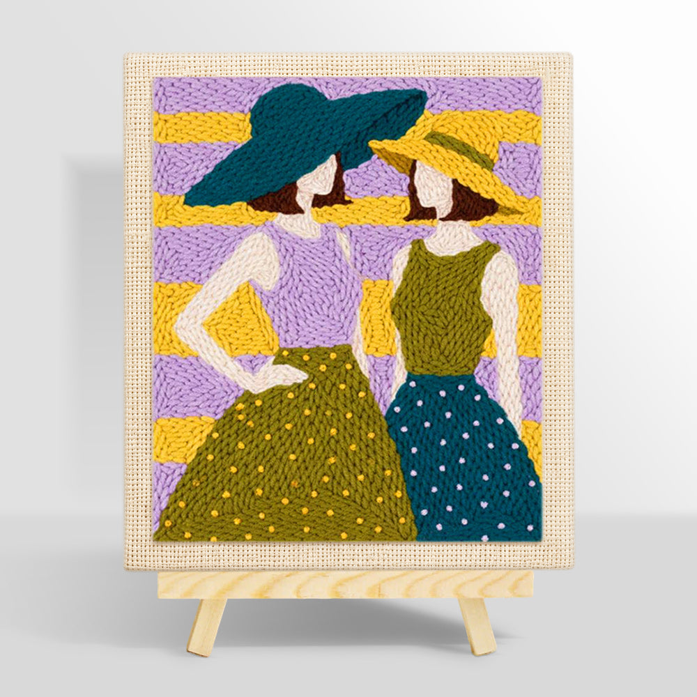 Two women in sun hats punch needle kit for beginners
