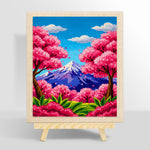 Vibrant cherry blossom trees and snowy peak punch needle kit for beginners