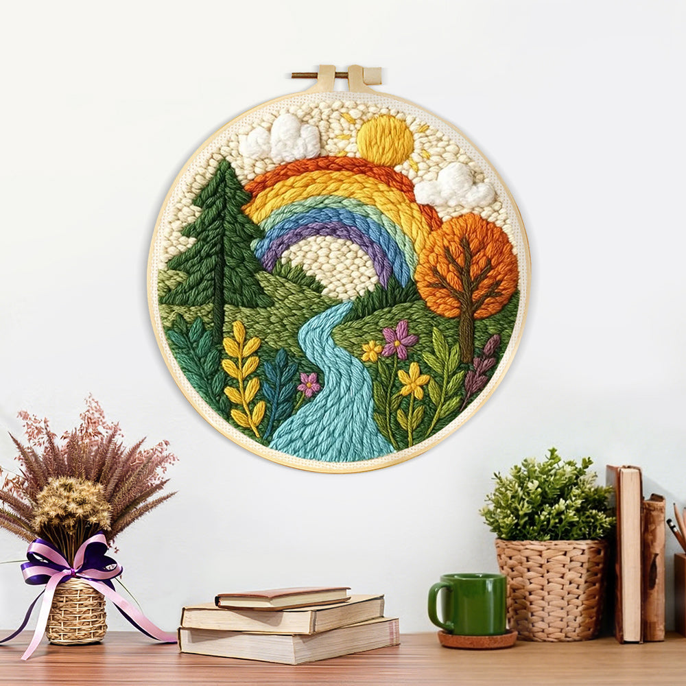 Finished vibrant countryside rainbow and river artwork displayed on a wall