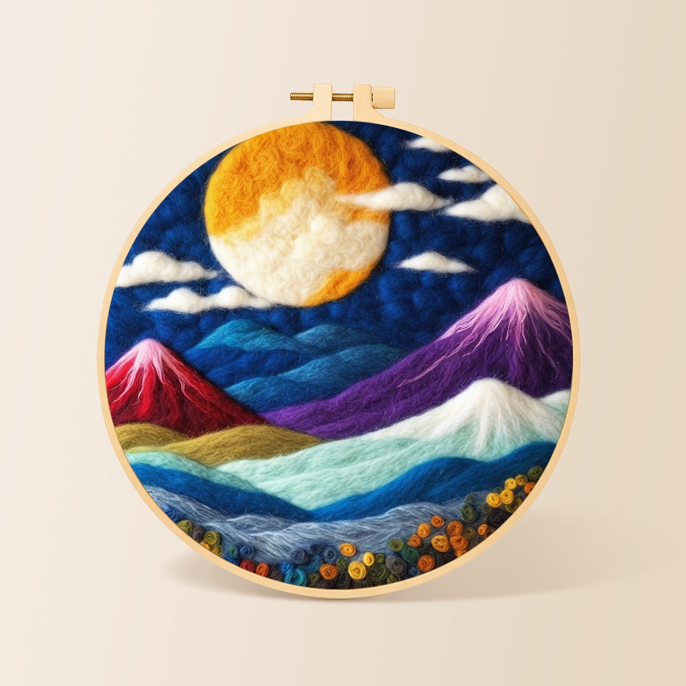 Vibrant full moon over mystical peaks needle felting kit for beginners with a round wooden frame