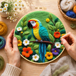 Creating the vibrant jungle parrot wool painting by hand with a felting needle
