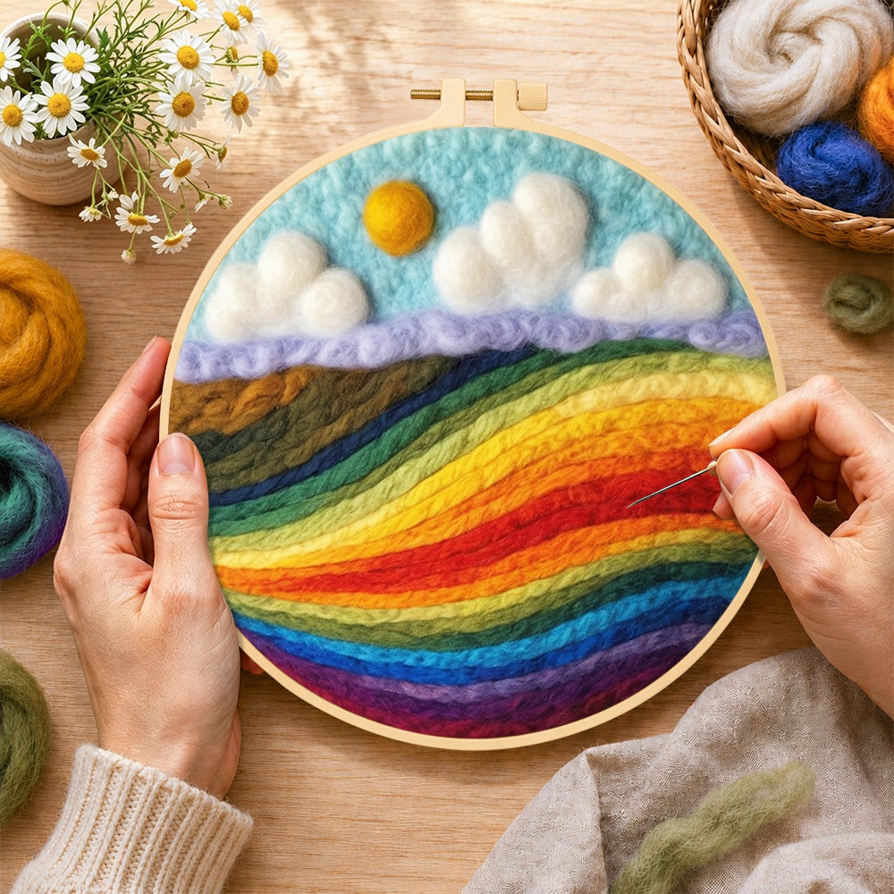 Creating the vibrant rainbow colour block landscape wool painting by hand with a felting needle