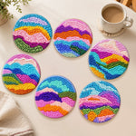 Vibrant rainbow mountains punch needle coasters used for home decoration