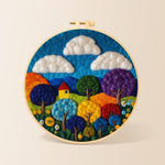 Vibrant rainbow trees needle felting kit for beginners with a round wooden frame