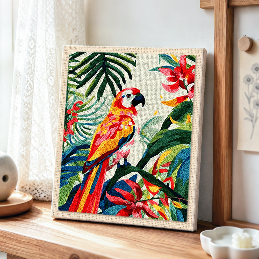 Vibrant tropical macaw parrot punch needle artwork displayed on a table
