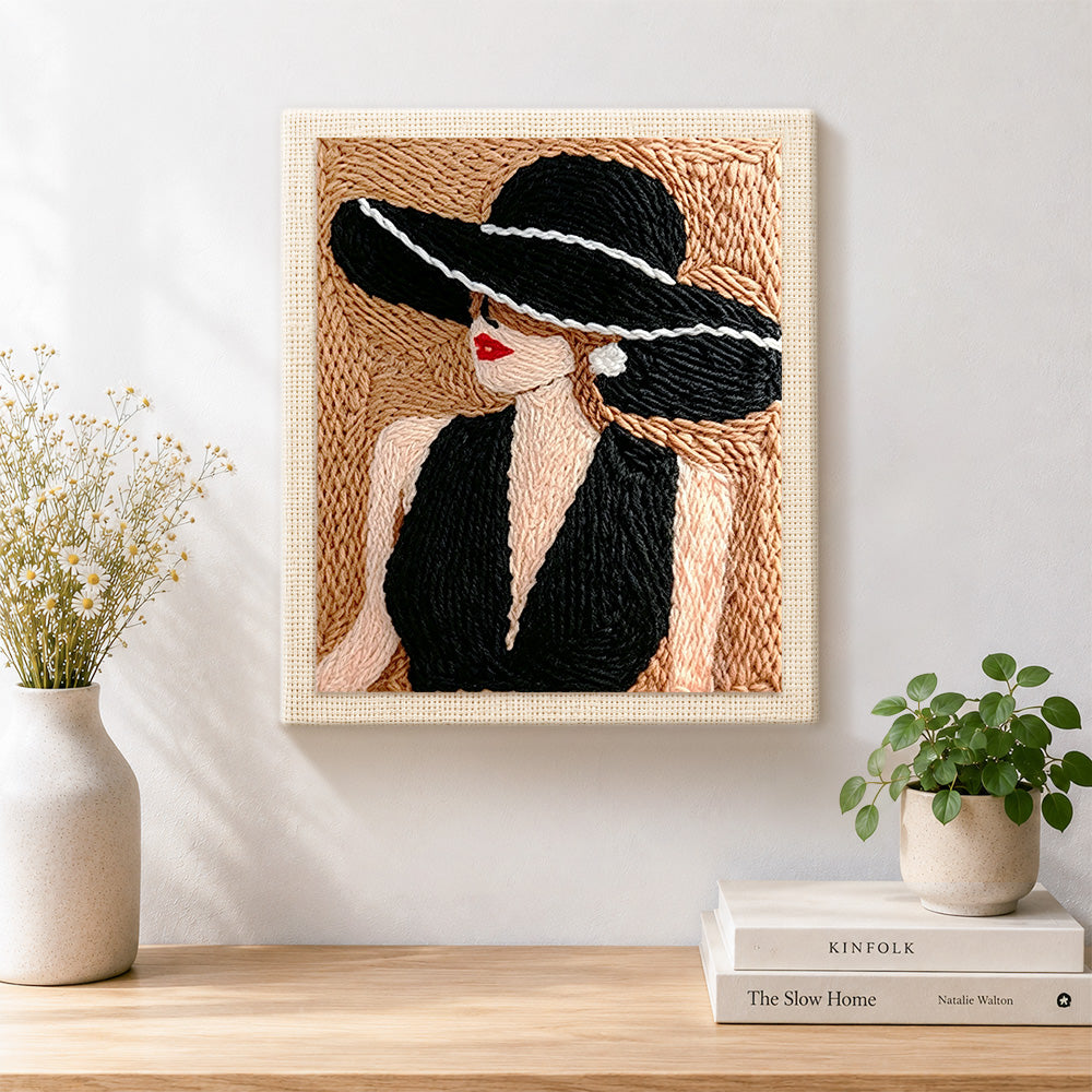 Finished vintage lady in black hat artwork displayed on a wall