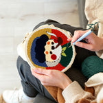Creating handmade vintage style cartoon character with pipe punch needle artwork
