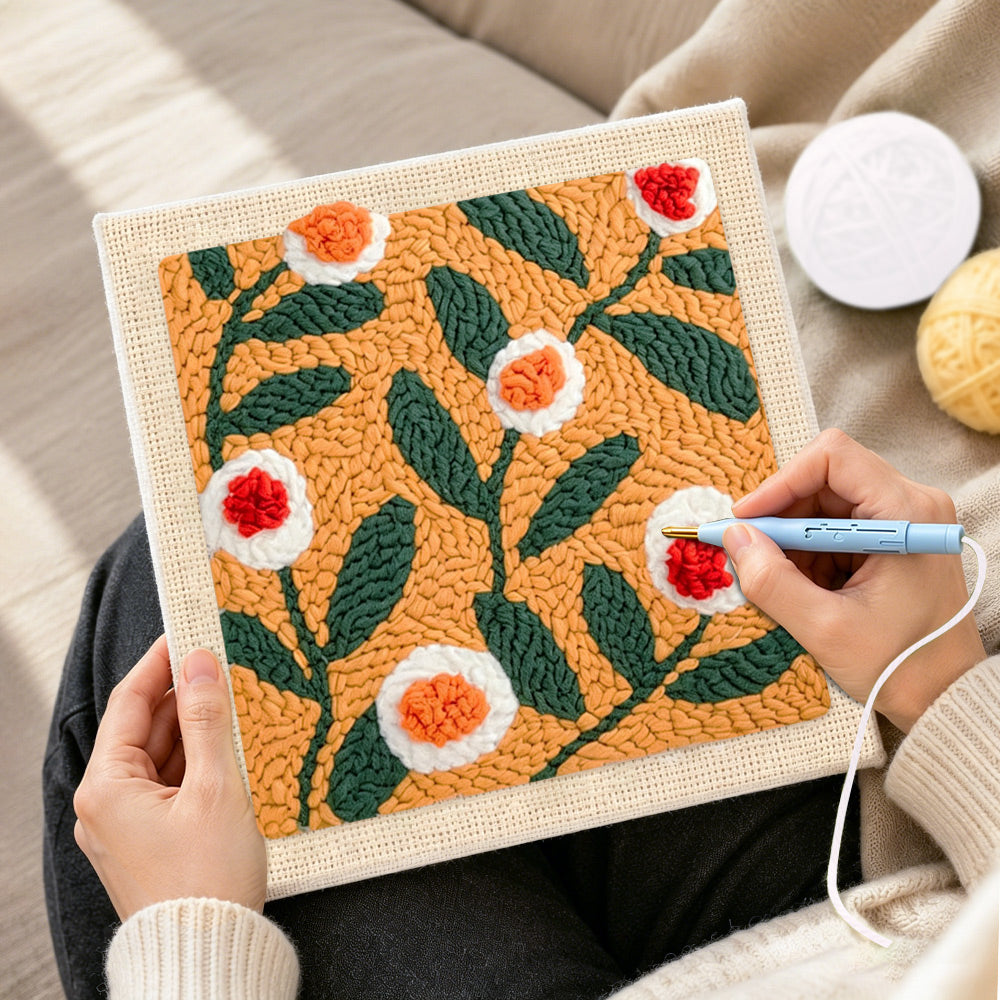 Creating handmade warm apricot floral punch needle artwork