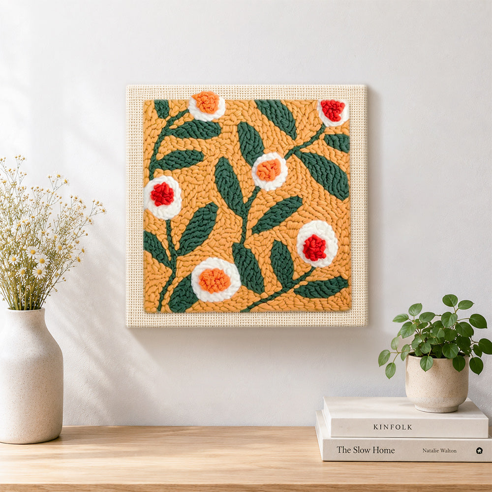 Finished warm apricot floral artwork displayed on a wall