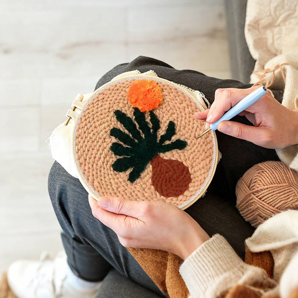 Creating handmade warm boho desert plant punch needle artwork