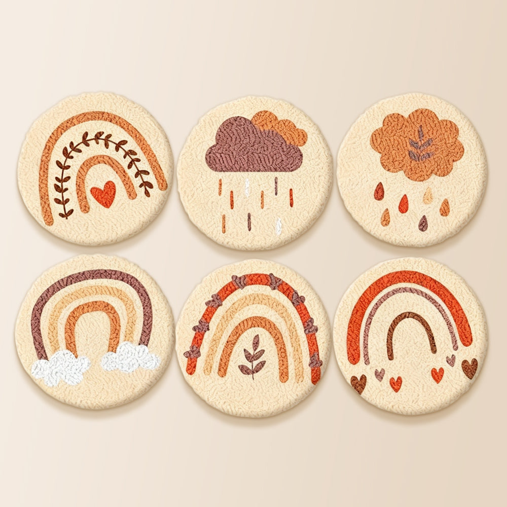Warm-toned rainbow and cloud punch needle coaster kit finished handmade coasters