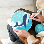 Creating handmade whale and waves punch needle artwork