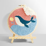 Whale jumping out of ocean in pink sky punch needle kit for beginners