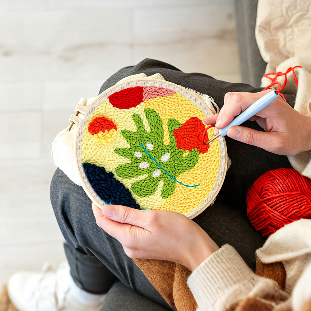 Creating handmade whimsical abstract leaves punch needle artwork