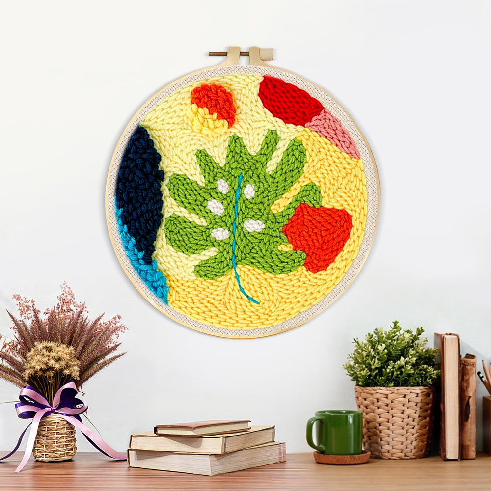 Finished whimsical abstract leaves artwork displayed on a wall