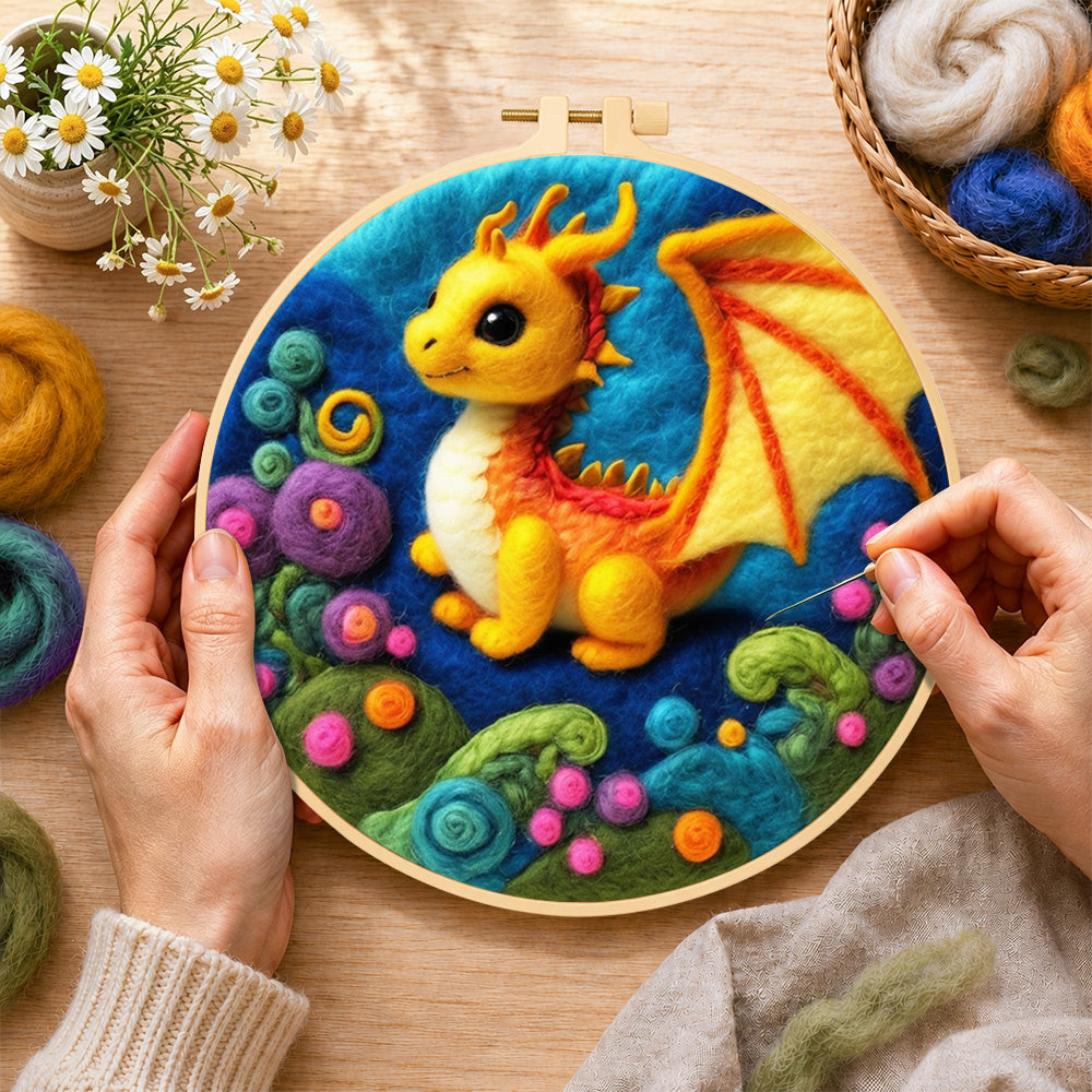 Creating the whimsical baby dragon and colourful spiral plant wool painting by hand with a felting needle