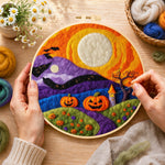 Creating the whimsical mountains and moon wool painting by hand with a felting needle