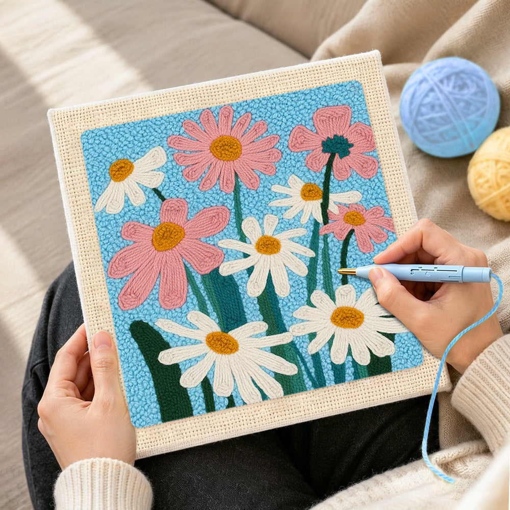 Creating handmade white and pink daisies punch needle artwork