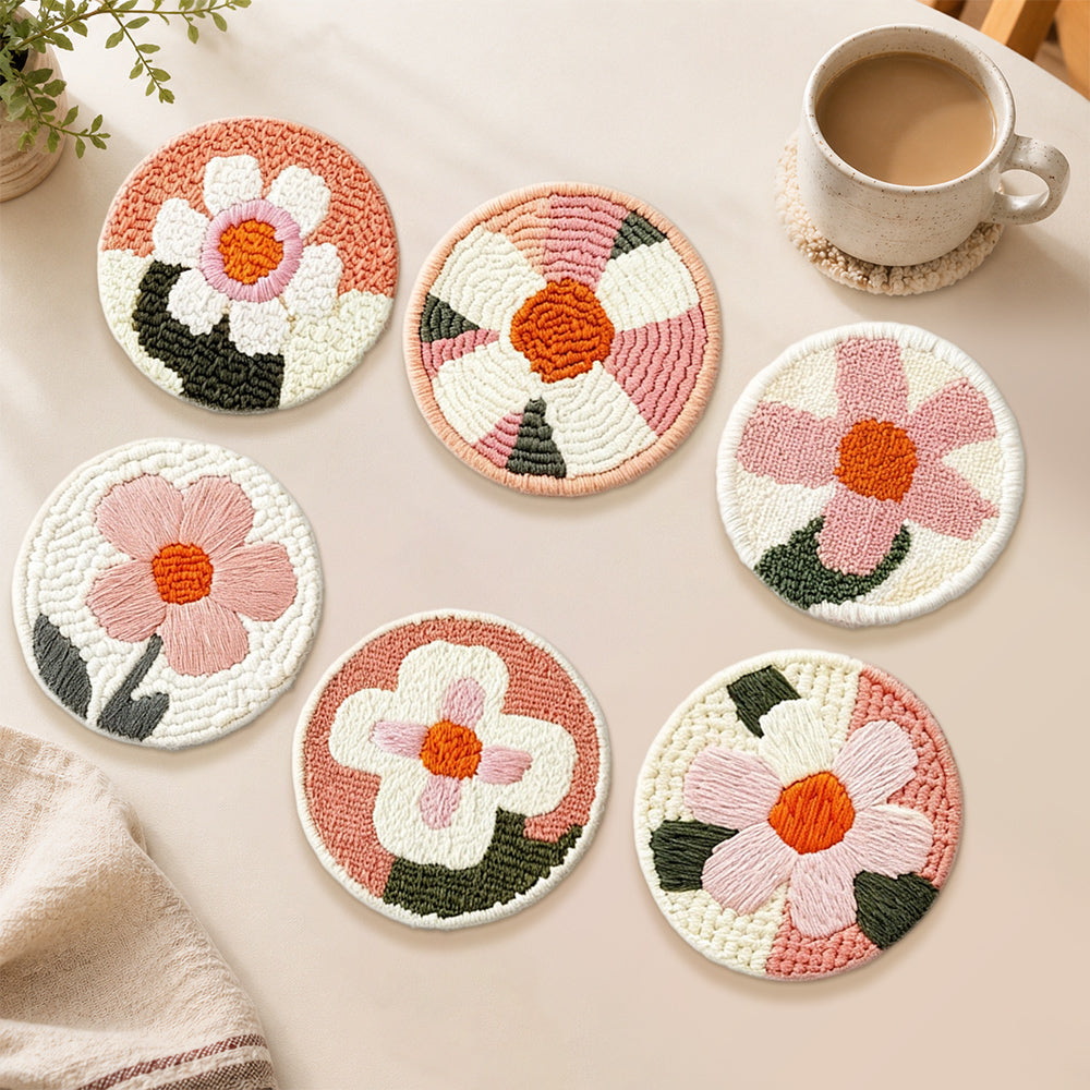 White and pink flowers punch needle coasters used for home decoration