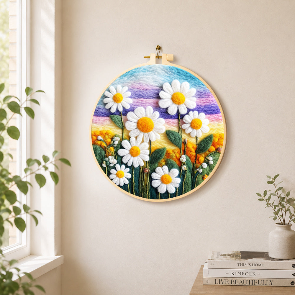 White daisies on rainbow background needle felt wall art displayed in a bright home interior