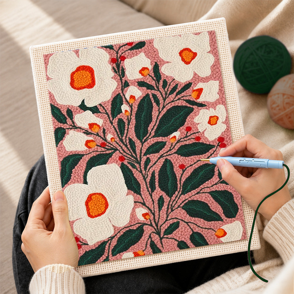 Creating handmade white florals on dusty pink background punch needle artwork