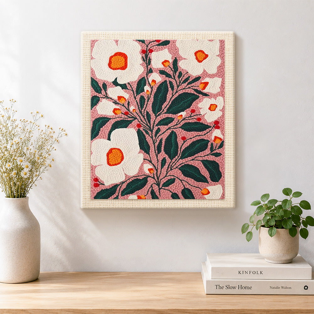 Finished white florals on dusty pink background artwork displayed on a wall