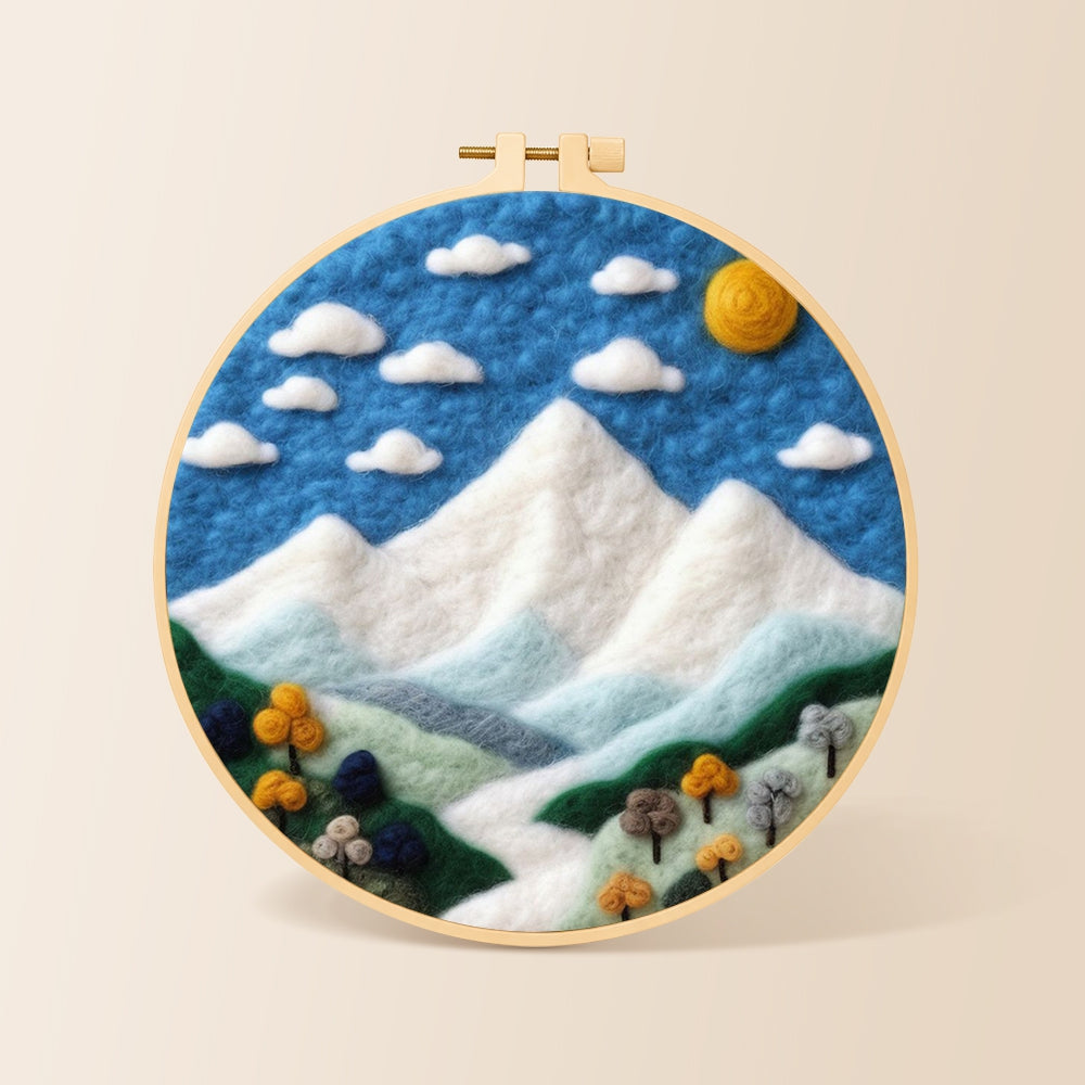 White mountain peaks under the blue sky needle felting kit for beginners with a round wooden frame