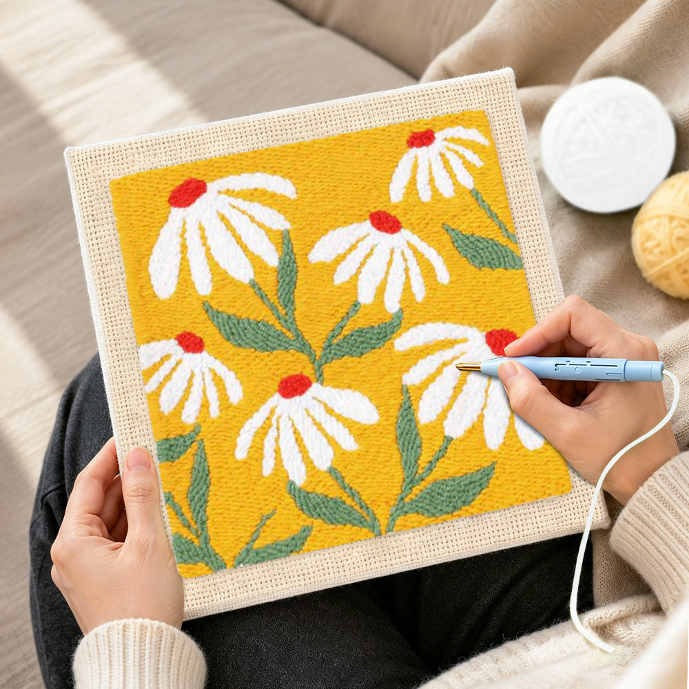 Creating handmade white petals with red centres punch needle artwork