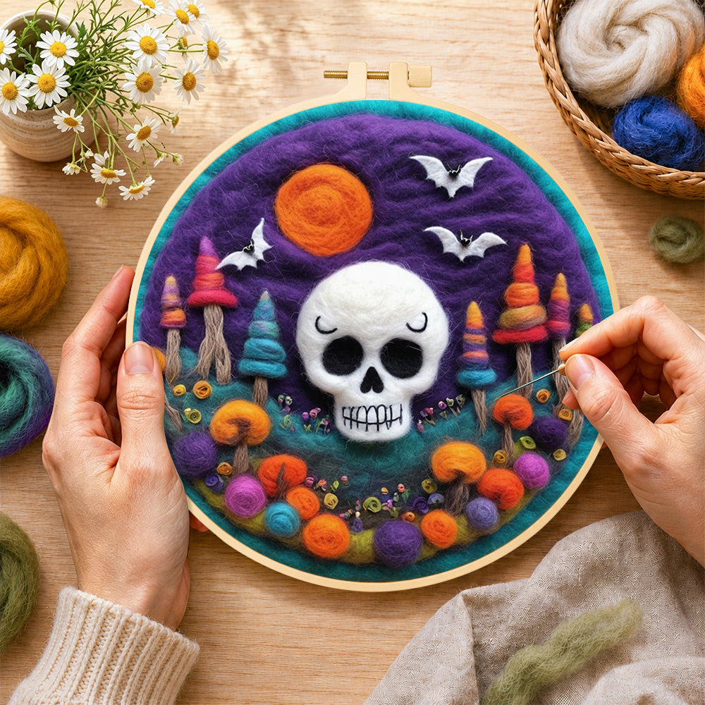Creating the white skull with colourful mushroom trees wool painting by hand with a felting needle