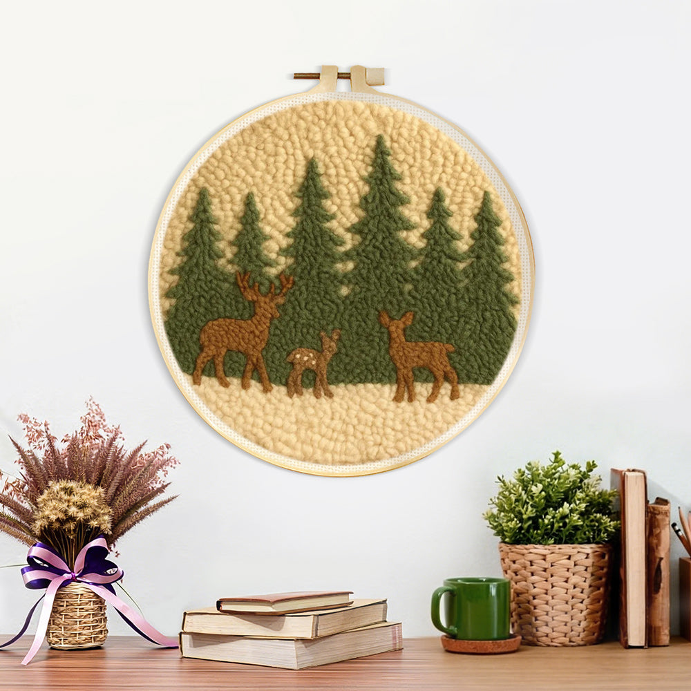 Finished wildlife deer and pine trees artwork displayed on a wall