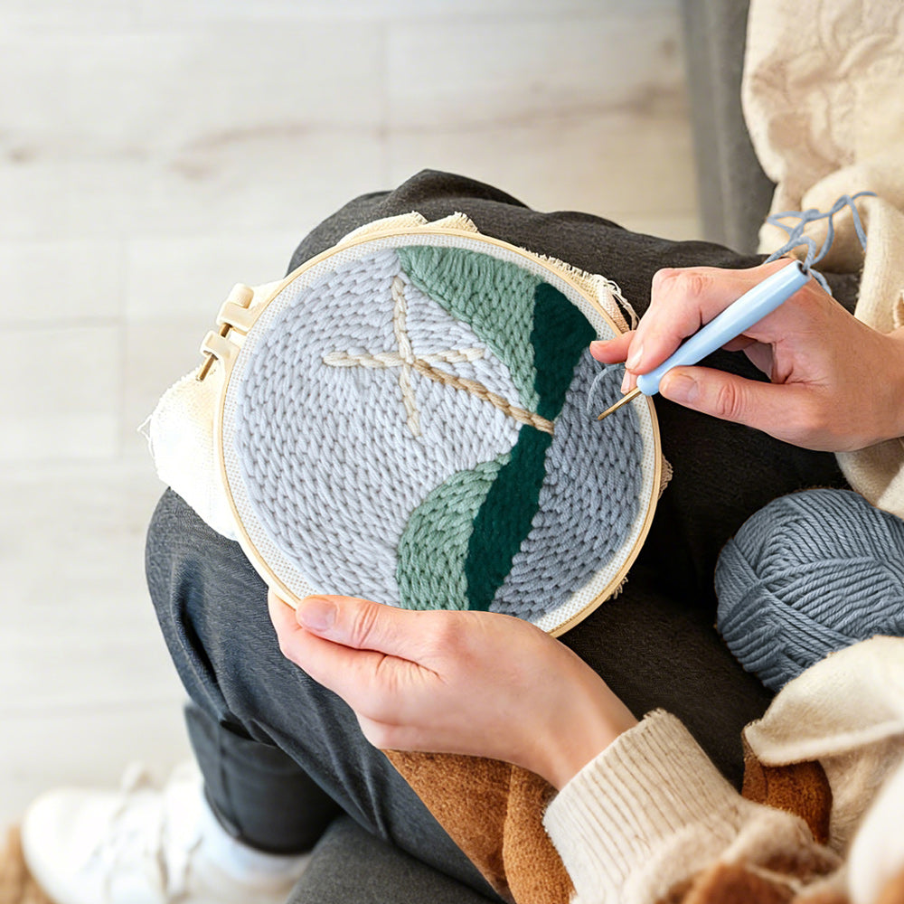Creating handmade windmill in mountain landscape punch needle artwork