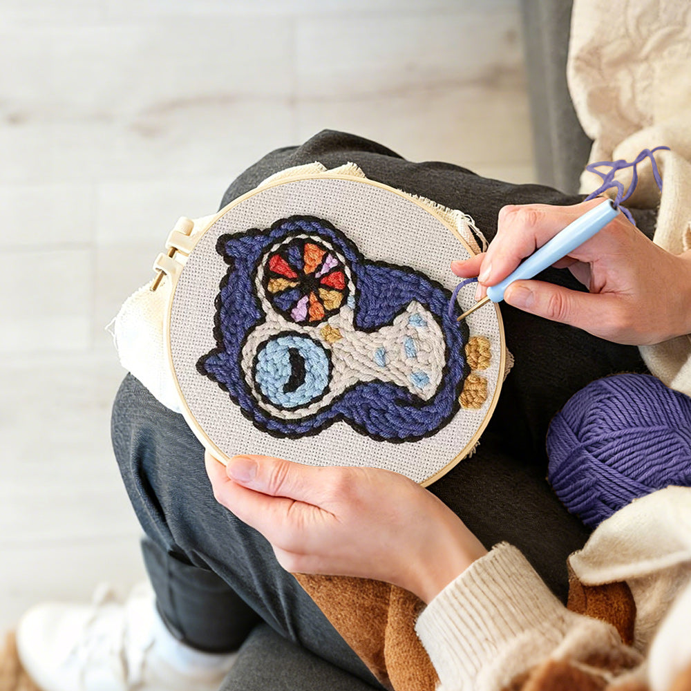 Creating handmade winking owl punch needle artwork