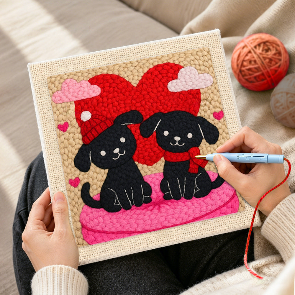 Creating handmade winter black puppies with red heart punch needle artwork