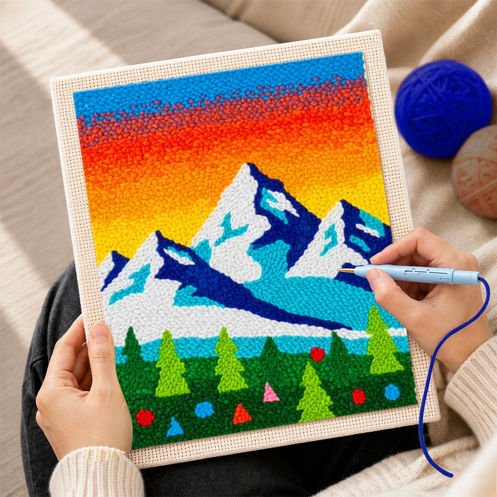 Creating handmade winter mountains and pine forest punch needle artwork