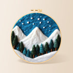 Winter snowy peaks and pine forest needle felting kit for beginners with a round wooden frame