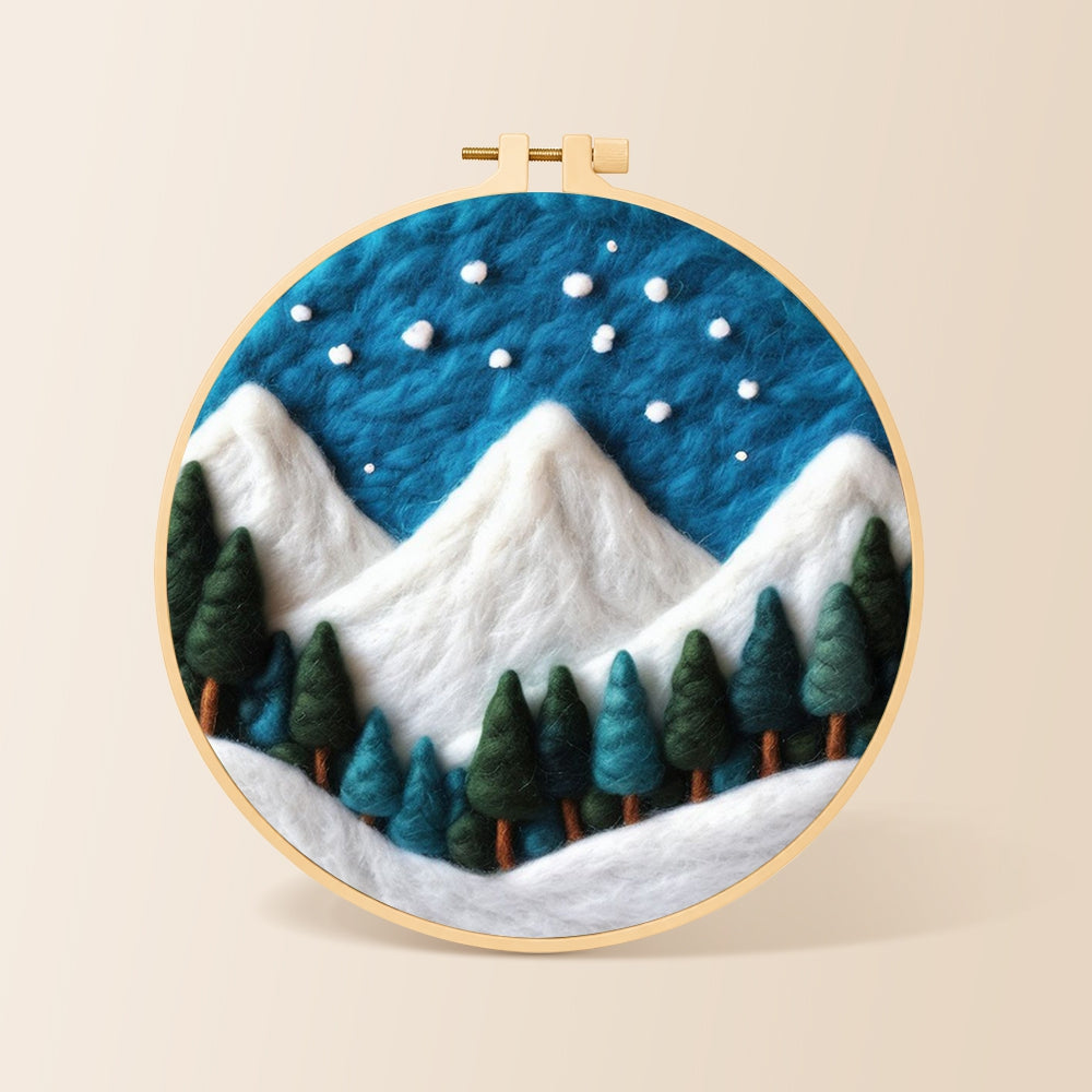 Winter snowy peaks and pine forest needle felting kit for beginners with a round wooden frame