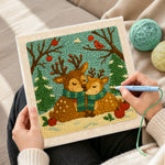 Creating handmade winter wonderland reindeer with scarves punch needle artwork