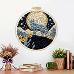 Finished wolf under moonlight artwork displayed on a wall