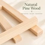 Close-up detail of wooden display easel stand with natural pine wood grain