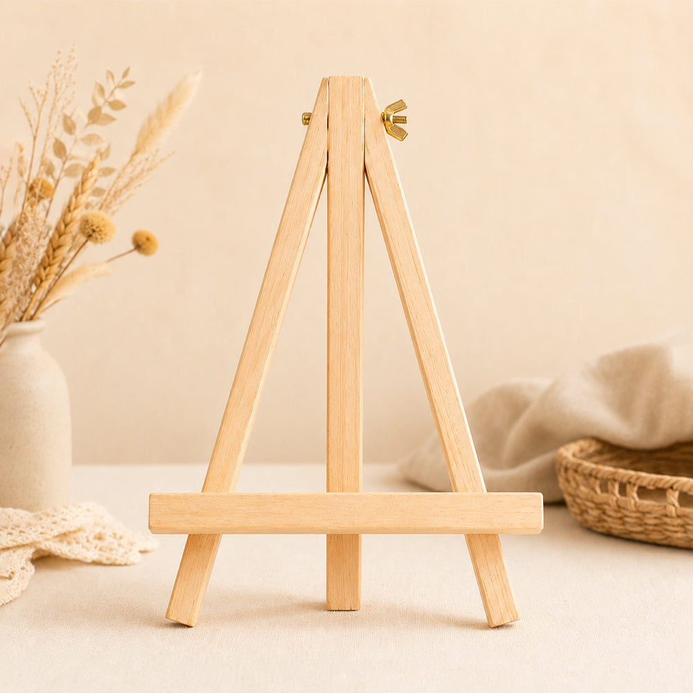 Wooden display easel stand in a warm craft room setting