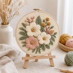 Wooden embroidery hoop used to display a finished punch needle embroidery project