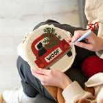 Creating handmade "woof" red truck with dog punch needle artwork